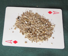 fine vermiculite on playing card